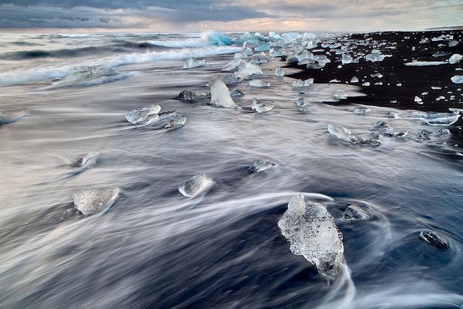 2-Day Ice Cave & South Coast: Glacier Hike and Glacier Lagoon - Day two: icebergs, black sand, and Atlantic surf
