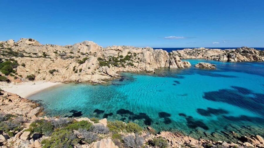 Caprera: hiking to Cala Coticcio with aperitif - Reaching Cala Coticcio across Caprera’s rocky coast
