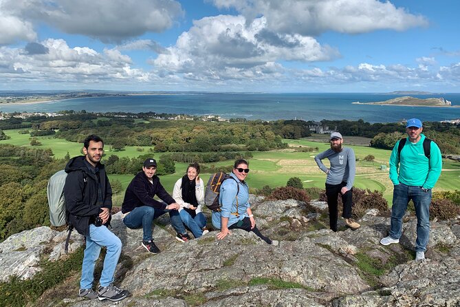 Dublin Coastal Hike with Howth Adventures - Climbing Howth Head through heather and gorse