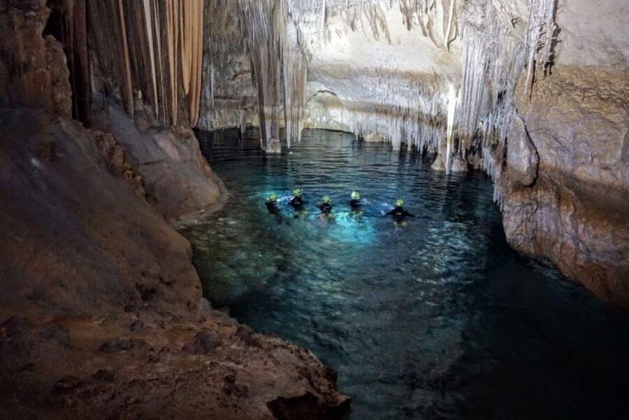 Estany d'en Mas: Coastal Hike, Abseil & Sea Cave Exploration - The 120-meter swim back to shore