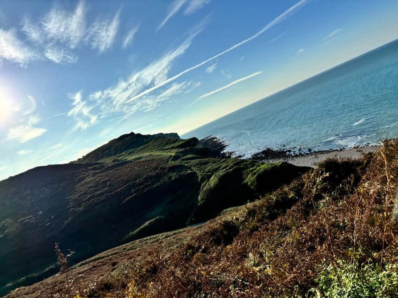 Étretat: hike the mythical cliffs of Étretat! - Antifer lighthouse above the sea