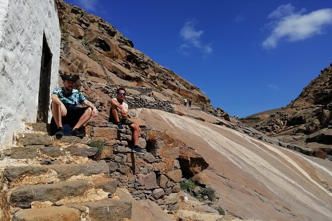Excursion to Ajuy Caves with a secret Las Penitas canyon Hike - Ajuy Caves, fishing village, and a rough Atlantic shore