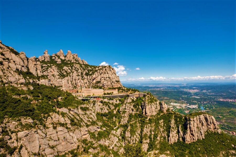 From Barcelona: Montserrat Monastery, Easy Hike, Cable Car - Taking the Cable Car Above the Mountain