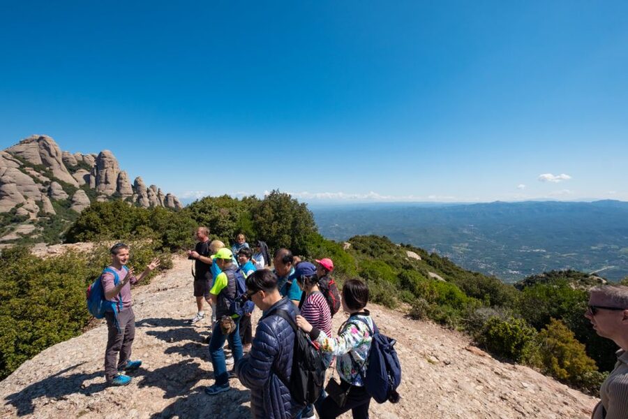 From Barcelona: Montserrat Monastery, Easy Hike, Cable Car - Entering Santa Maria de Montserrat Monastery