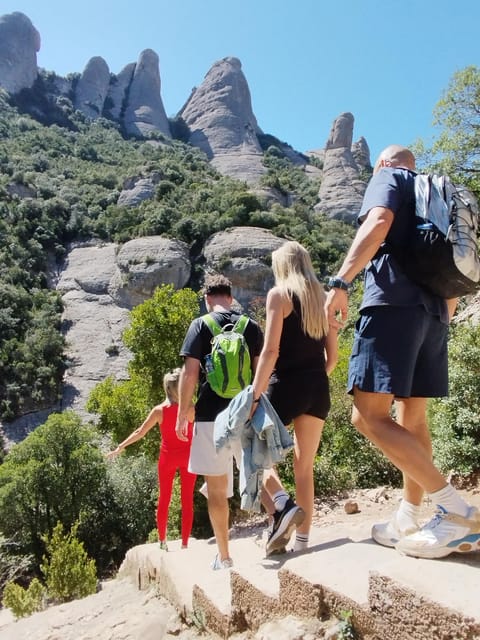 From Barcelona: Montserrat Monastery & Hike with Cable Car - Entering the Benedictine Abbey