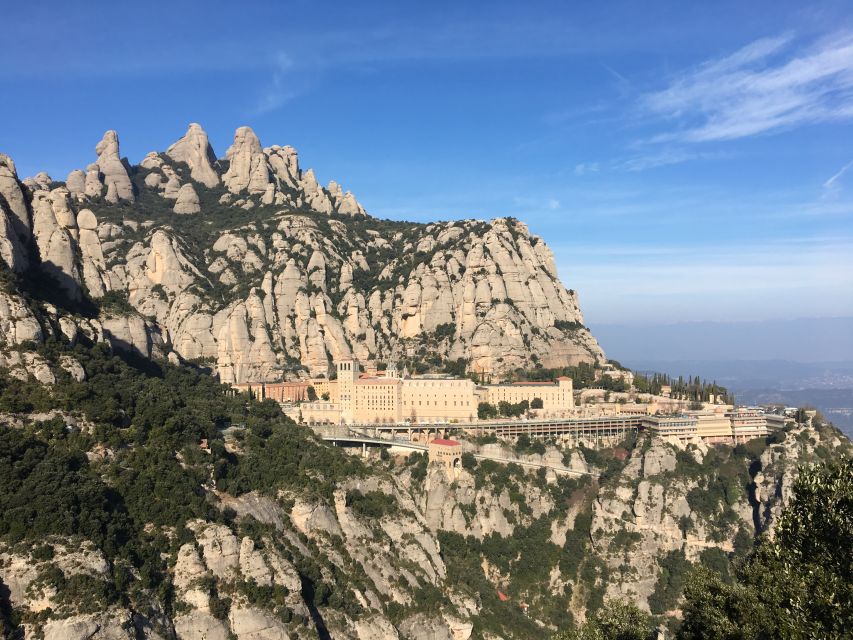 From Barcelona: Montserrat Monastery & Scenic Mountain Hike - Free Time for Markets, Food, and a Final Look