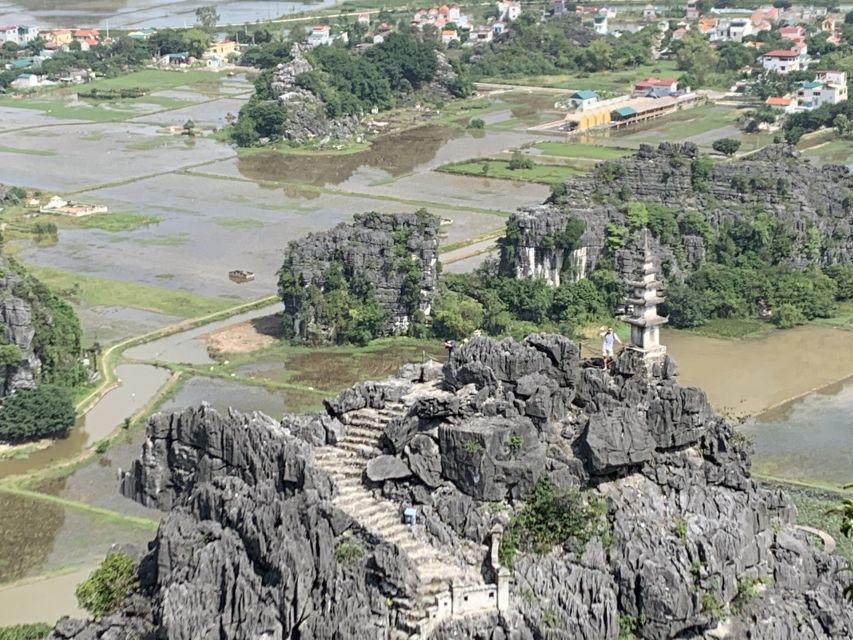 From Hanoi: Hoa Lu, Hang Mua Hike, Tam Coc Boat, and Lunch - Cruising Tam Coc by sampan