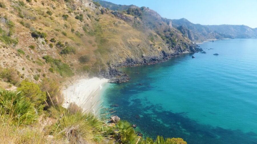 From Malaga: Cliffs of Maro Hike w/ Beach Visit & Snorkeling - Reaching the beach and getting into the water