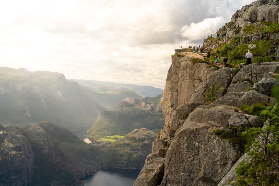 From Stavanger: Pulpit Rock Guided Hike with Pickup - Reaching Preikestolen above Lysefjorden