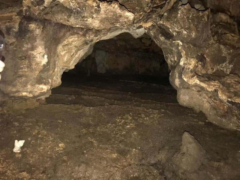 From Tirana: Hiking to Pellumbas Cave & visiting the Canyon - Entering the 70-meter Black Cave
