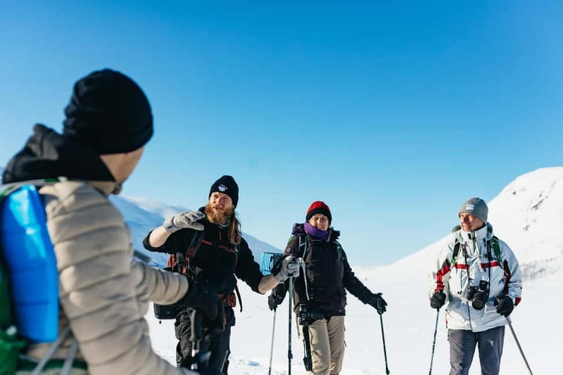From Tromsø: Snowshoeing Hike with Picnic Lunch and Photos - Learning to walk in snowshoes