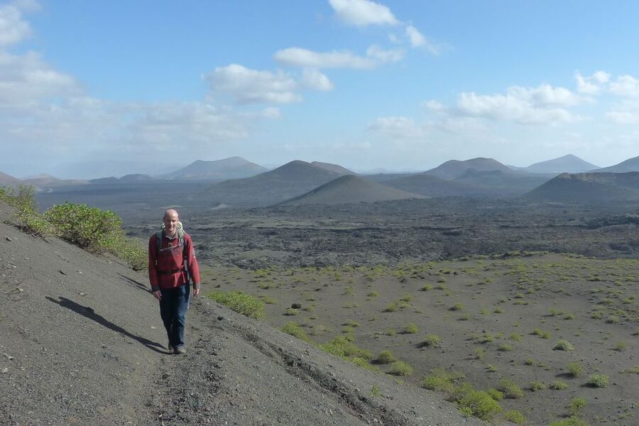 Lanzarote: Guided Volcano Hike with Transfers - Walking across old lava fields