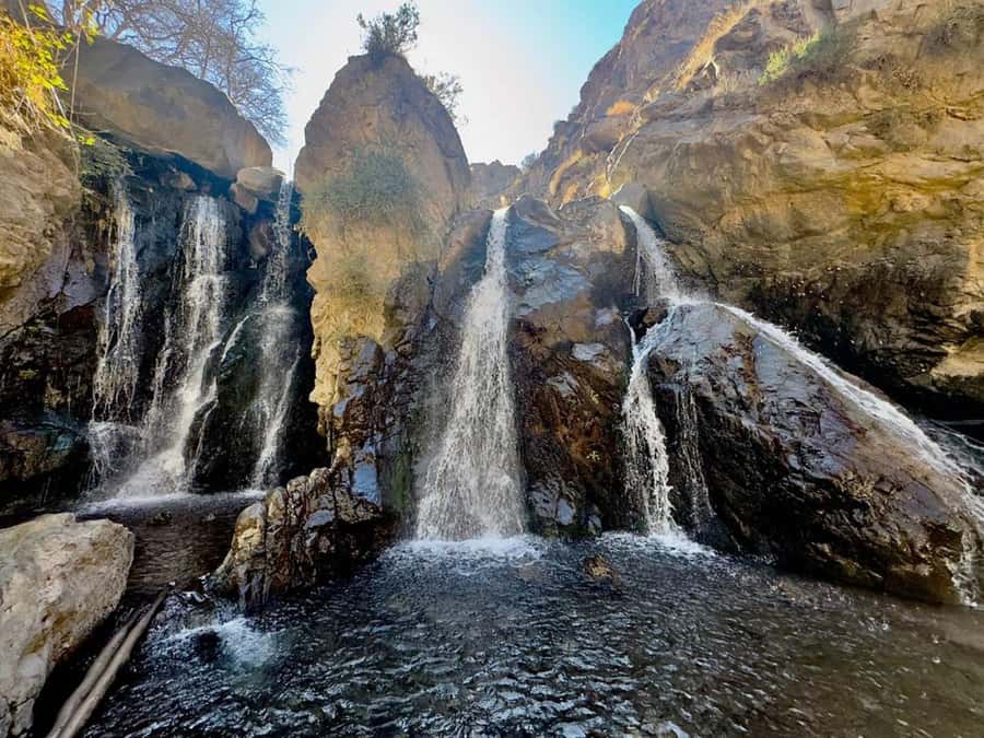 Marrakech: ourika valley lunch & guided hike to waterfalls - Riverside lunch with the Atlas Mountains behind you