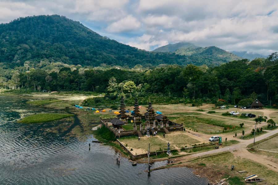 Munduk: Twin Lake Jungle Hike, Ulun Danu Temple, & Waterfall - Crossing Tamblingan in a Traditional Canoe