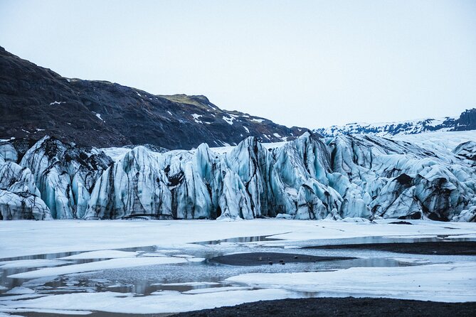 Private South Coast with Glacier Hike in Iceland - Reynisfjara shows Iceland’s darker coast
