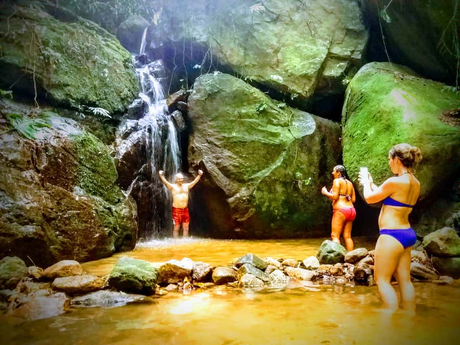 Rio: Tijuca Forest Small Group Hike to Caves and Waterfalls - The waterfall shower at Baronesa Cascade