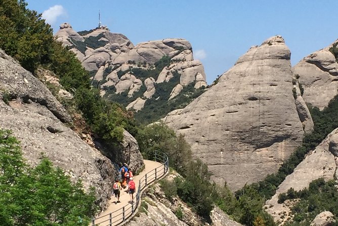 Semi-Private Montserrat Monastery, Funicular & Scenic Nature Walk - Inside the basilica and monastery