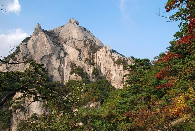 Seoul Mountain Hike: Temples, Folklore & Traditional Meal - The steep opening climb