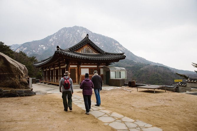 Seoul Mountain Hike: Temples, Folklore & Traditional Meal - Meeting at Gupabal Station and reaching the trail