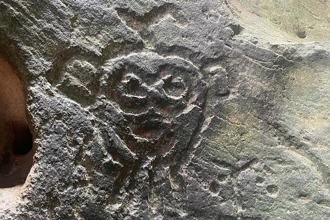Taino Indian Cave, Arecibo Hike and Beach Tour from San Juan - Taíno carvings inside the cave